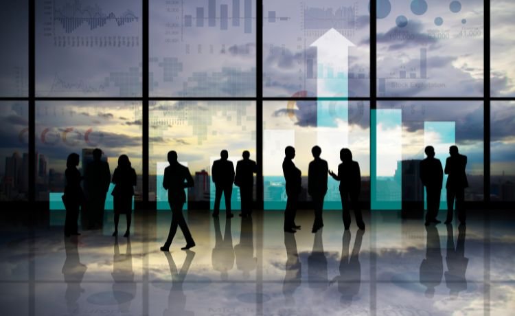 Property Investors standing near building glass discussing smsf growth