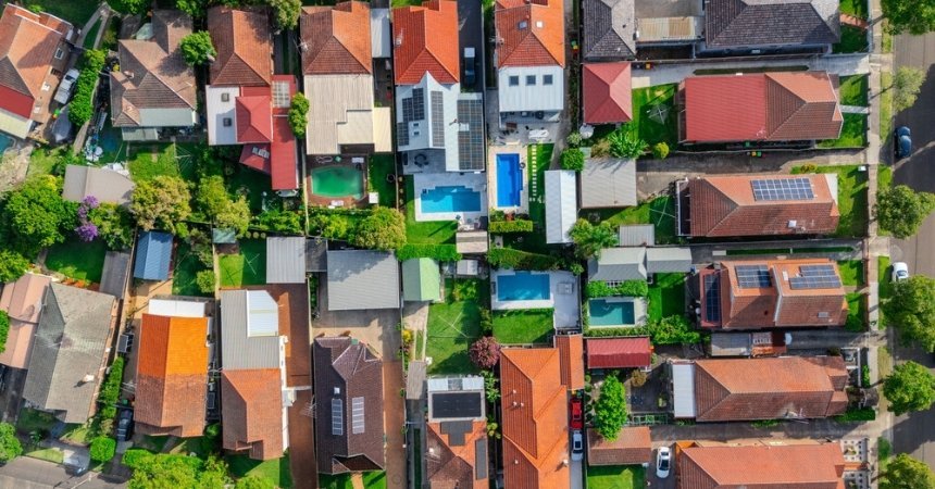Aerial view of residential neighborhood representing property investment strategy 2026 and housing market trends